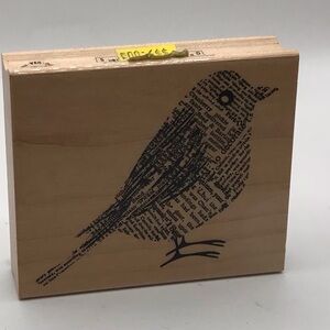 Wood base bird stamp never used newspaper print look